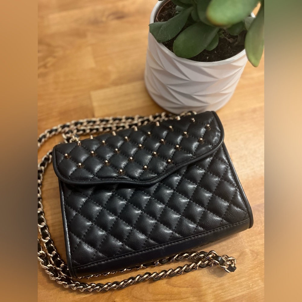 Rebecca Minkoff-Mini Quilted Black W/
Studded Rose Gold- UsedExcellent Condition